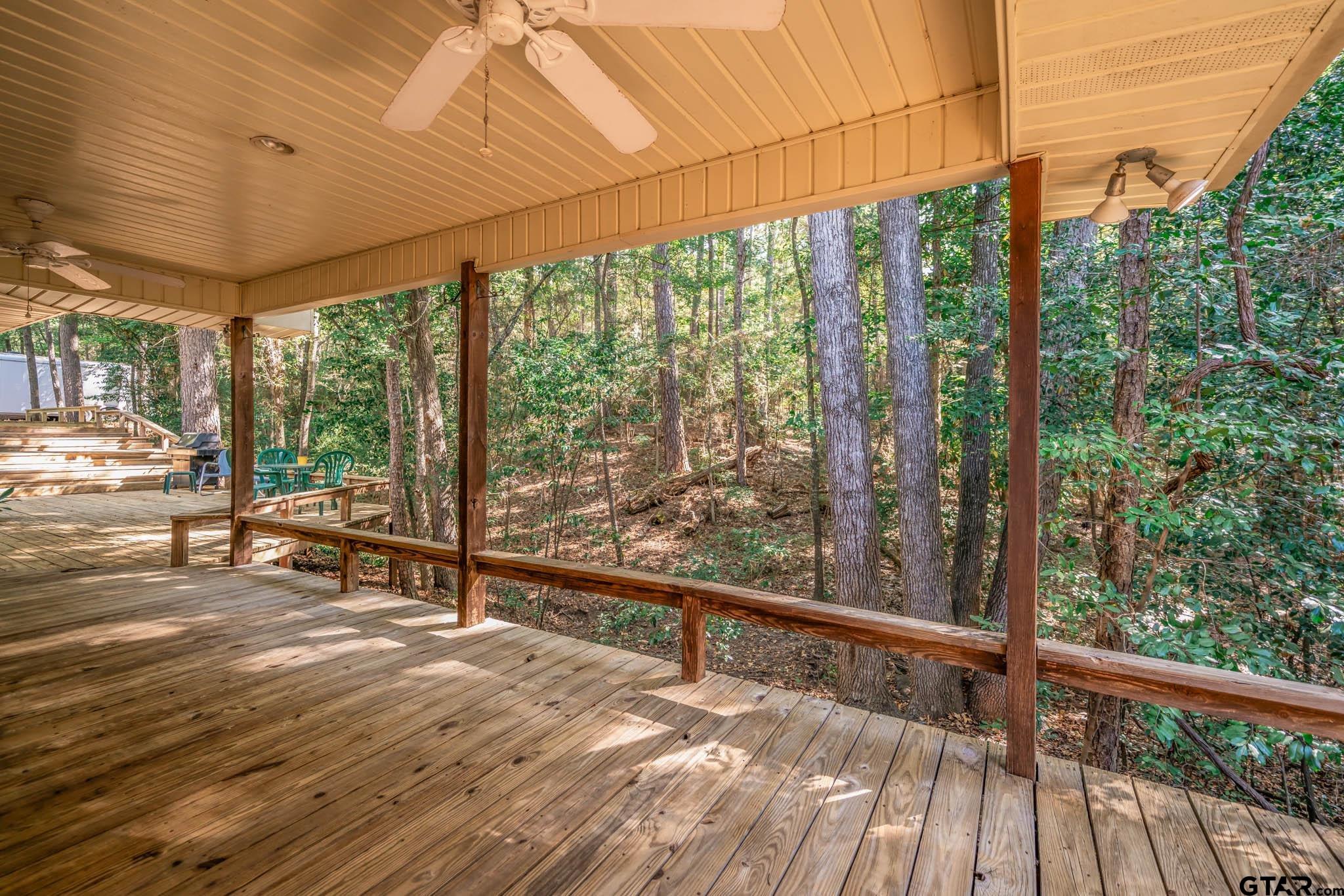 431 Gifford Street Rusk, TX 75785 - Photo 47 of 48 a view of a room with wooden floor and iron stairs