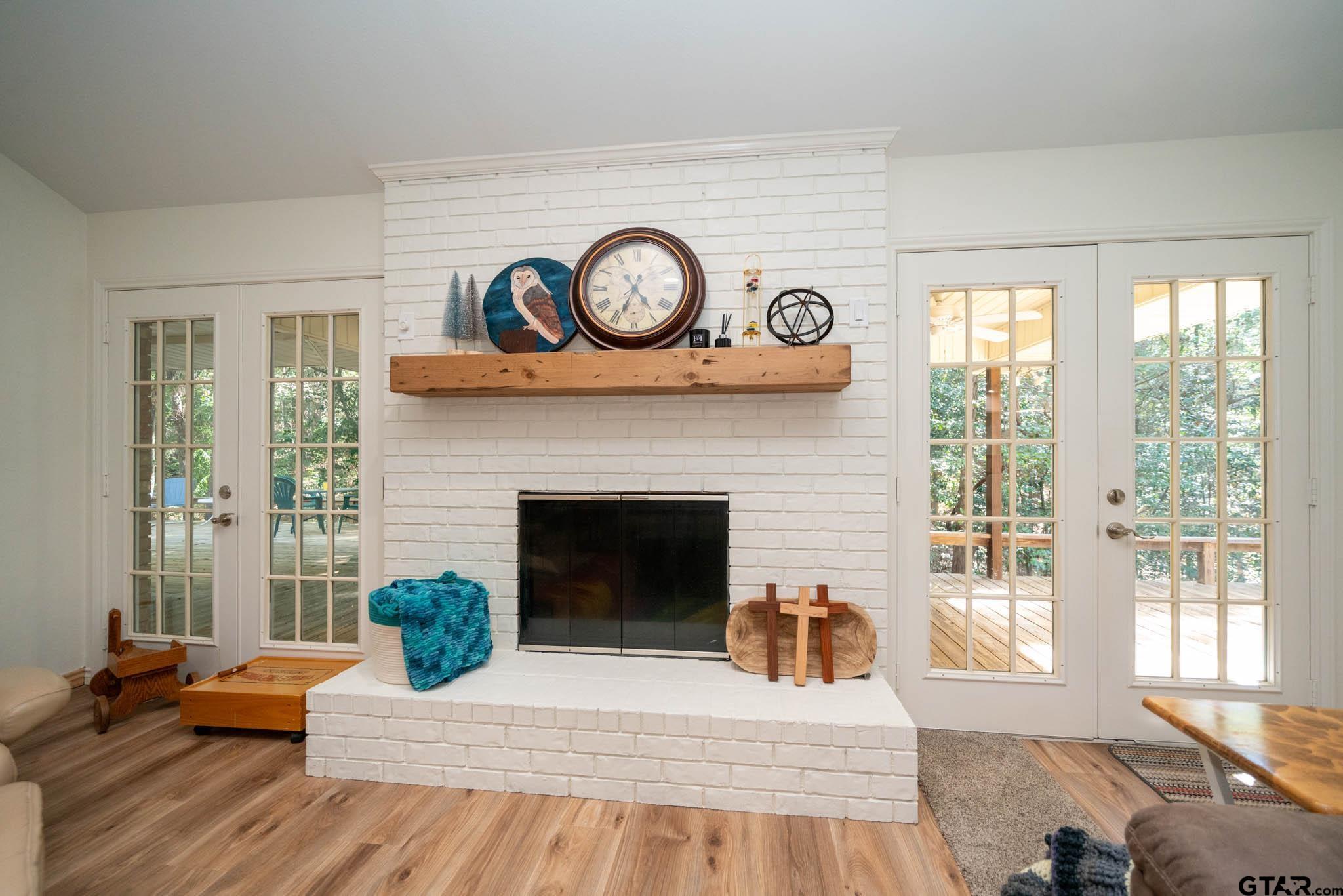 431 Gifford Street Rusk, TX 75785 - Photo 10 of 48 a living room with furniture and a fireplace