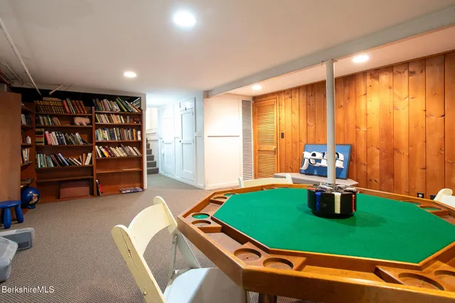 a room with furniture and gym equipment