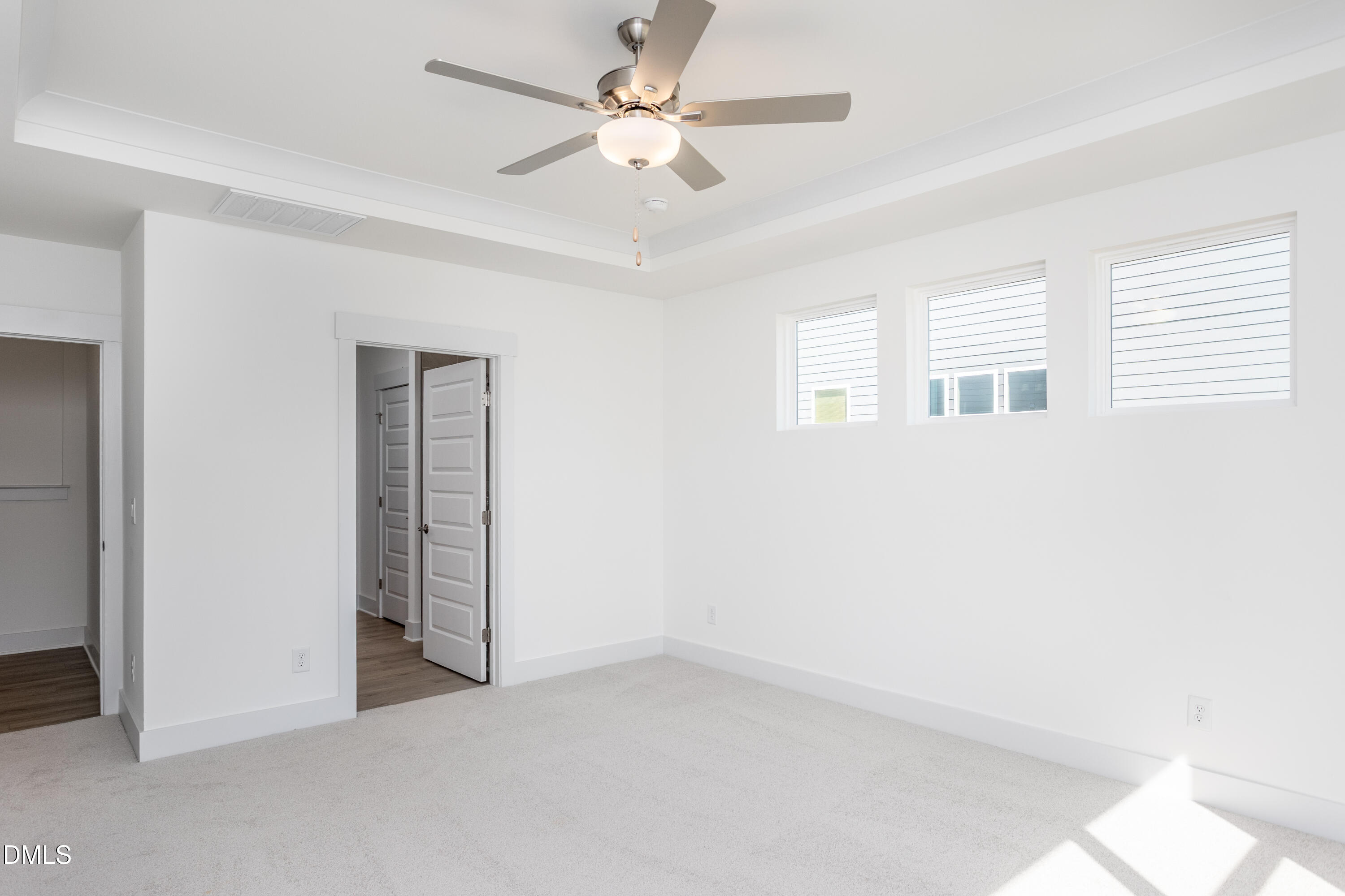 70 Slippery Elm Road Youngsville, NC 27596 - Photo 15 of 32 wooden floor in an empty room with a window