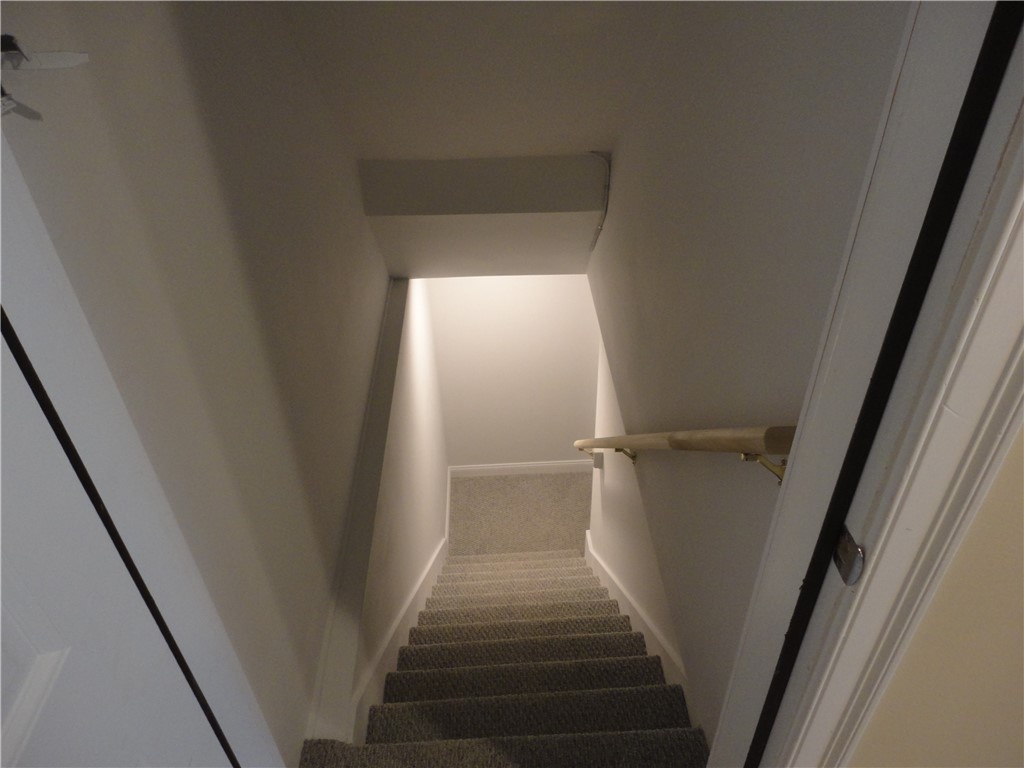 200 Post Road, Unit 104 Warwick, RI 02888 - Photo 18 of 27 Carpeted Stairs to Basement