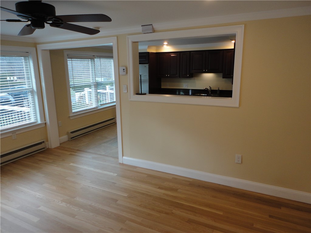 200 Post Road, Unit 104 Warwick, RI 02888 - Photo 7 of 27 Living Room into Kitchen