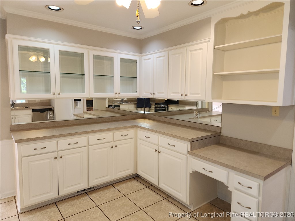 2814 Millbrook Road Fayetteville, NC 28303 - Photo 5 of 24 Ample cabinets/built in desk
