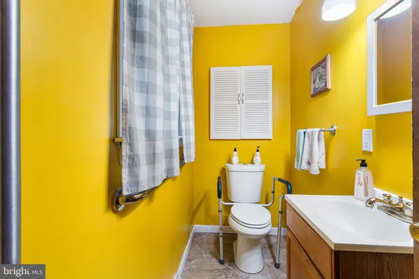 a bathroom with a sink and a toilet