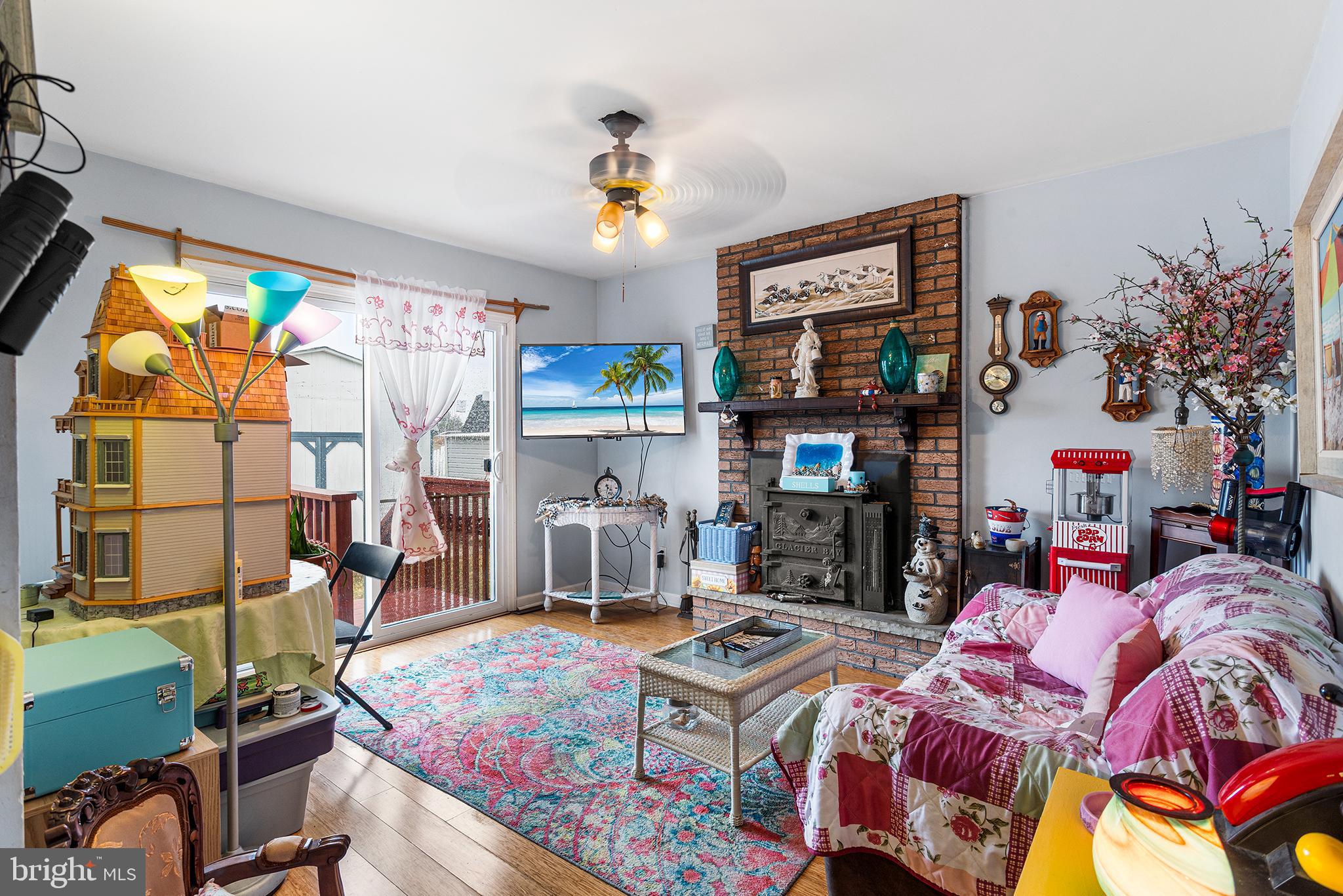 45 Heald Road Brigantine, NJ 08203 - Photo 14 of 25 a bed room with a bed and a tv