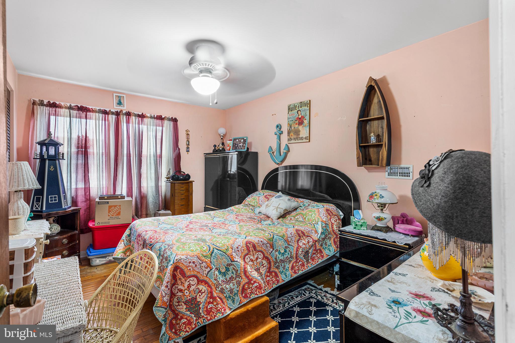 45 Heald Road Brigantine, NJ 08203 - Photo 17 of 25 a bedroom with bed and a window