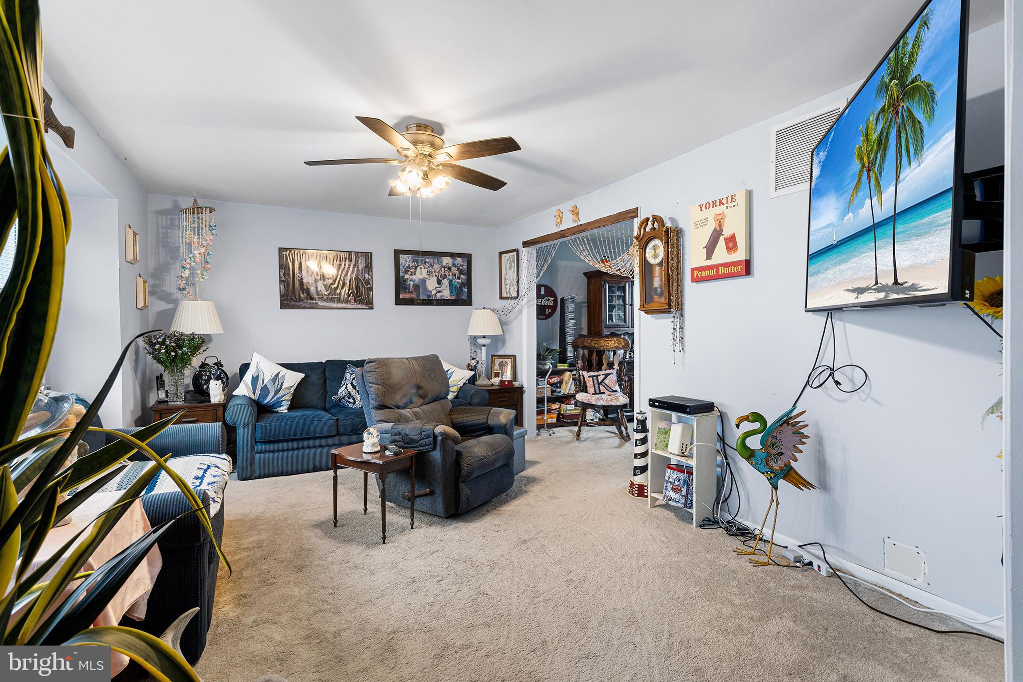 45 Heald Road Brigantine, NJ 08203 - Photo 6 of 25 a living room with furniture and a flat screen tv