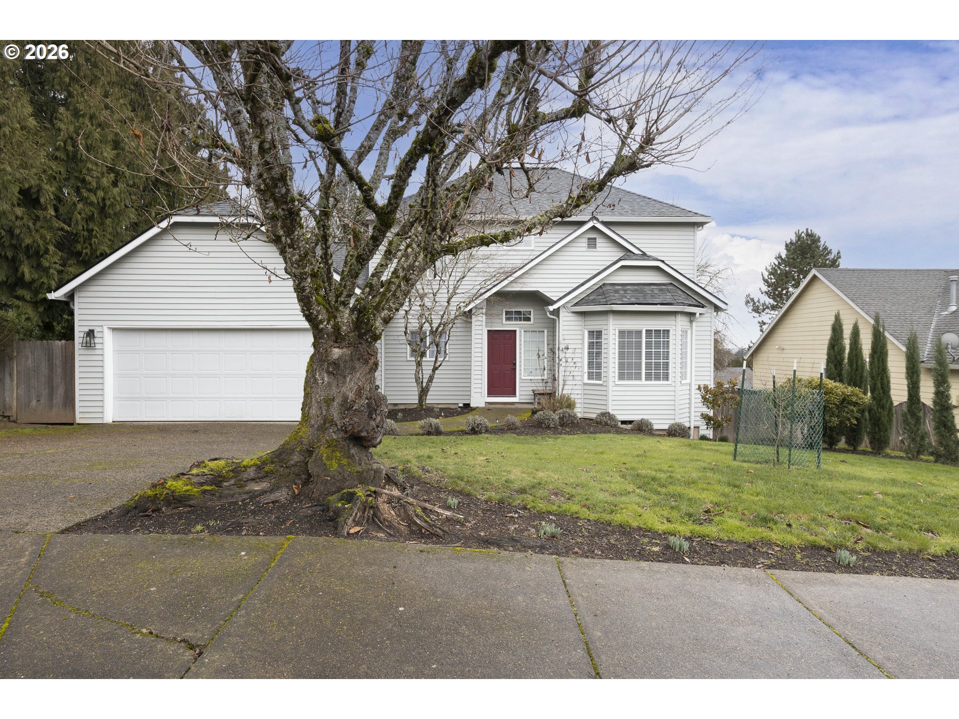 165 Northwest Peach Street Dundee, OR 97115 - Photo 2 of 35 a front view of a house with a yard