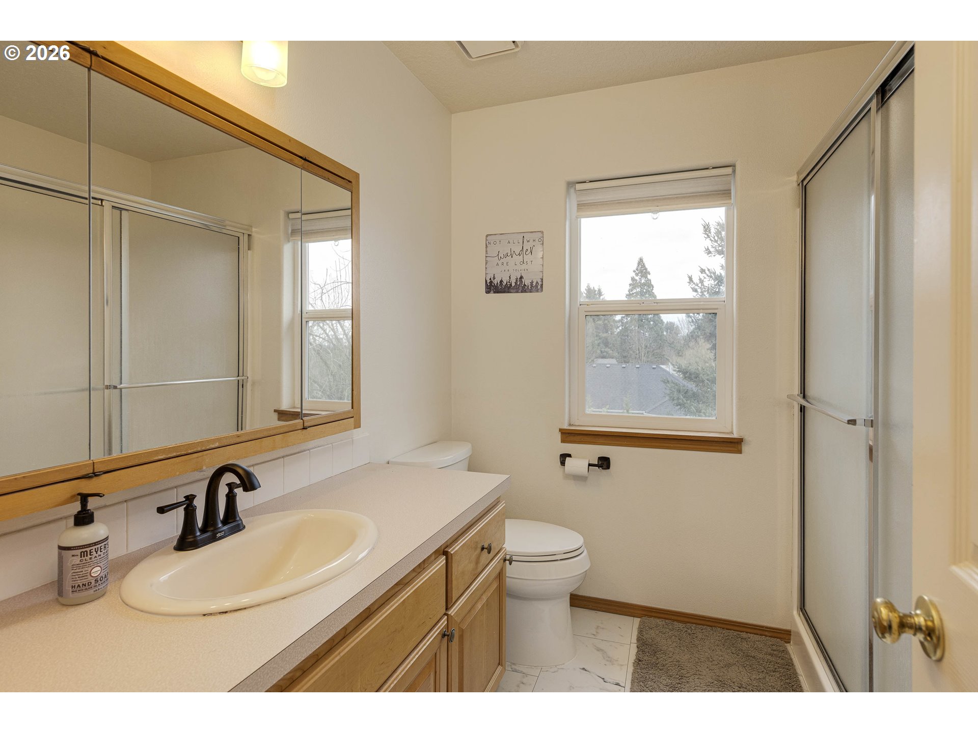 165 Northwest Peach Street Dundee, OR 97115 - Photo 23 of 35 a bathroom with a sink toilet a mirror and shower