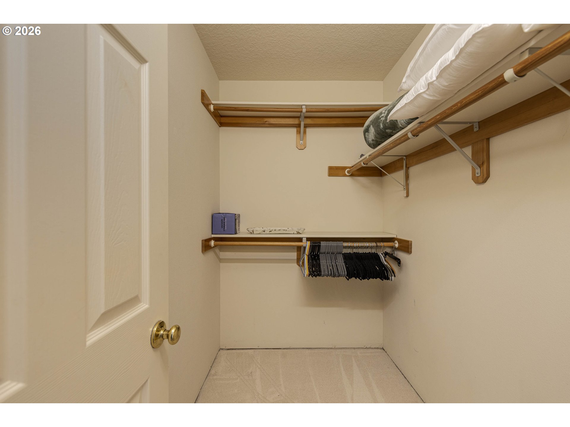 165 Northwest Peach Street Dundee, OR 97115 - Photo 24 of 35 a view of a room with racks on the wall