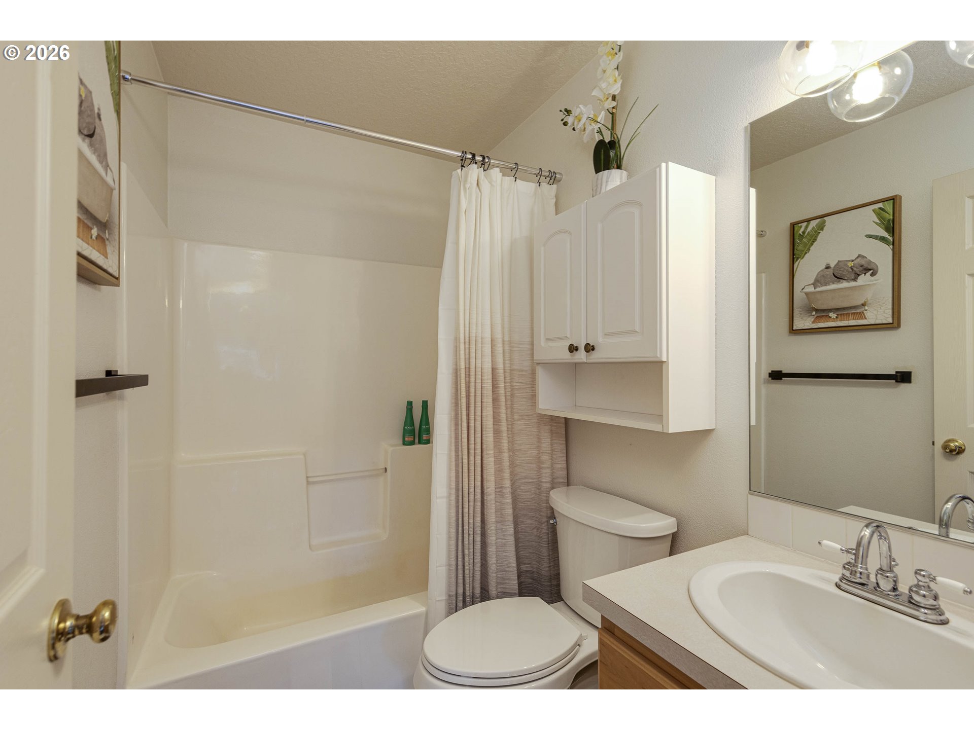 165 Northwest Peach Street Dundee, OR 97115 - Photo 27 of 35 a bathroom with a granite countertop sink toilet and shower