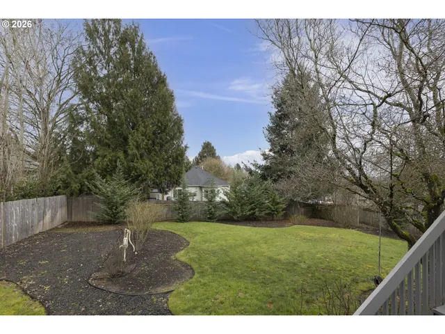 a view of outdoor space with playground and green space