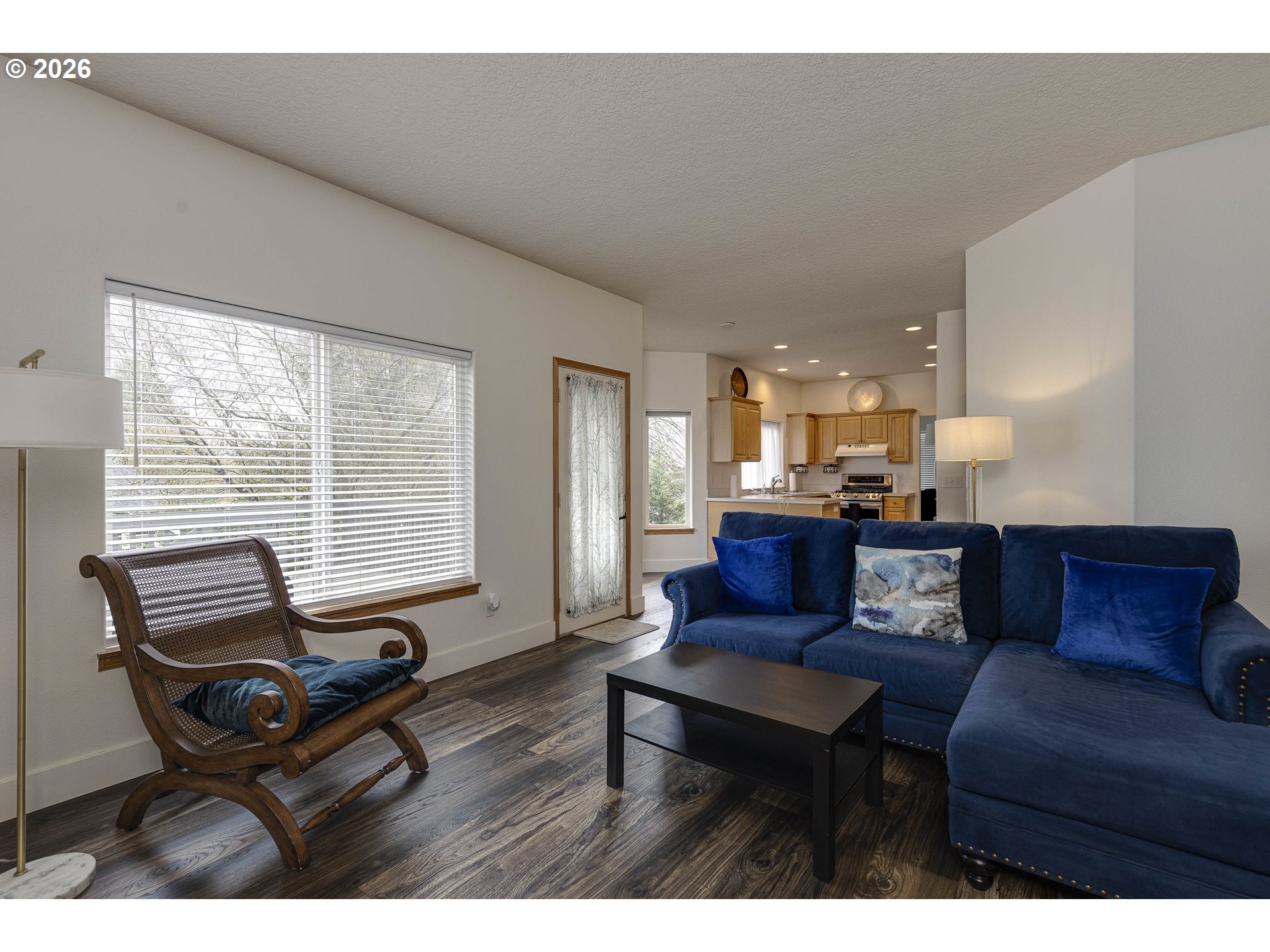 165 Northwest Peach Street Dundee, OR 97115 - Photo 6 of 35 a living room with furniture and a large window