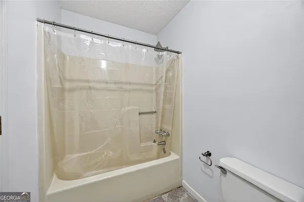 a bathroom with a bathtub