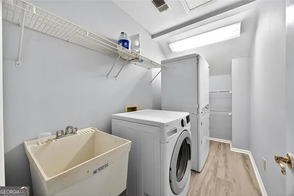 a utility room with dryer and washer