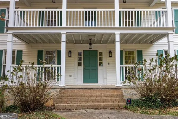 front view of a house with a small window