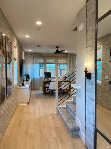 a room with furniture and a wooden floor