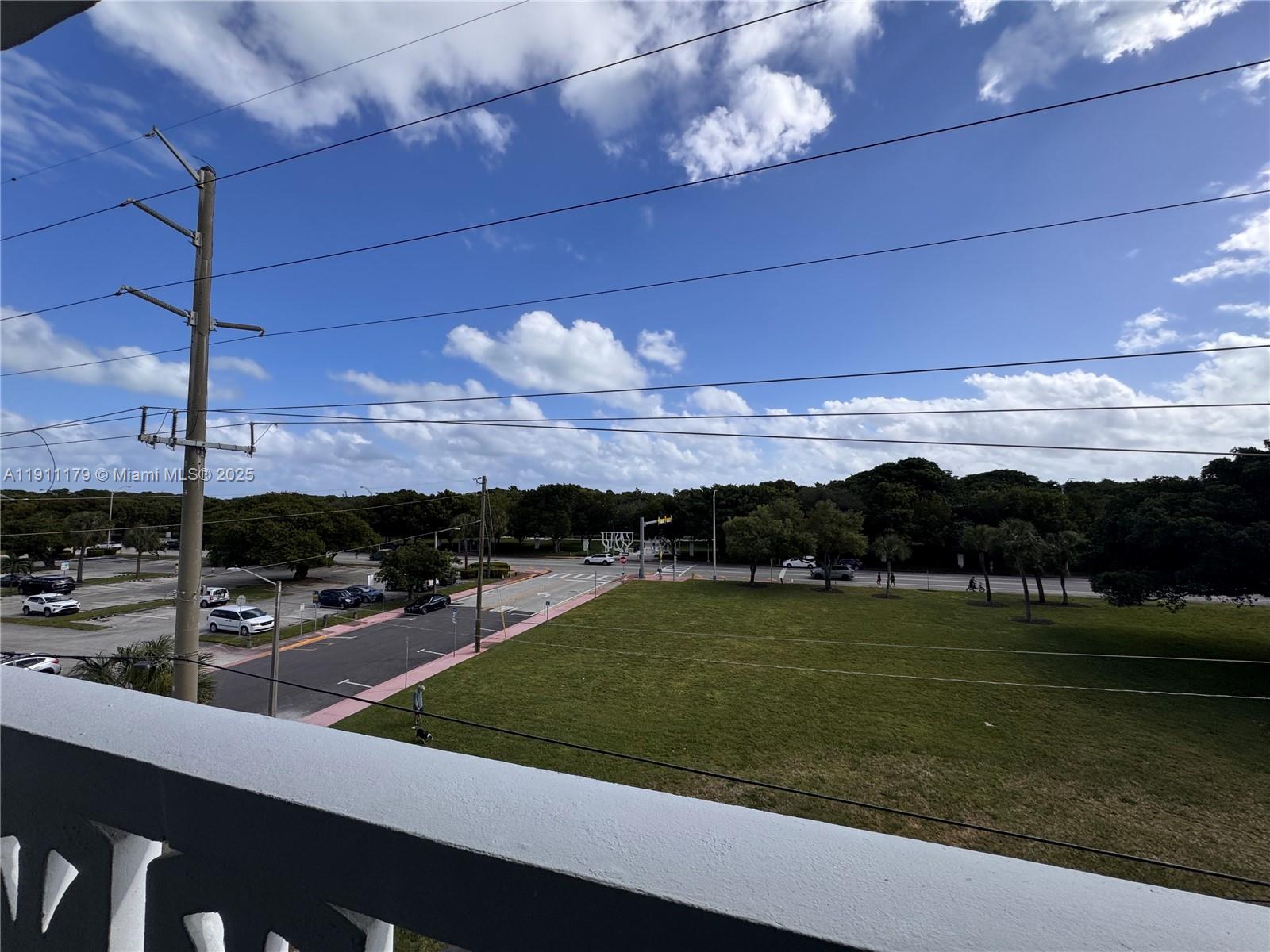 a view of a swimming pool with an outdoor seating