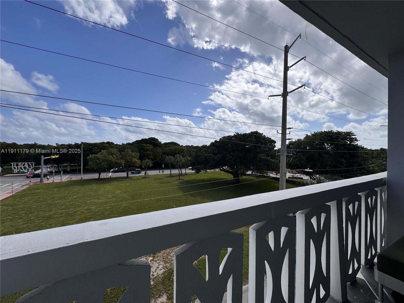 8233 Harding Avenue, Unit 403 Miami Beach, FL 33141 - Photo 2 of 11 a view of a street with an ocean view
