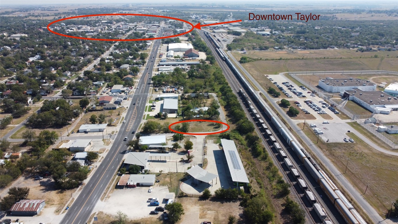 1018 West 1st Street Taylor, TX 76574 - Photo 3 of 17 a city view with tall buildings