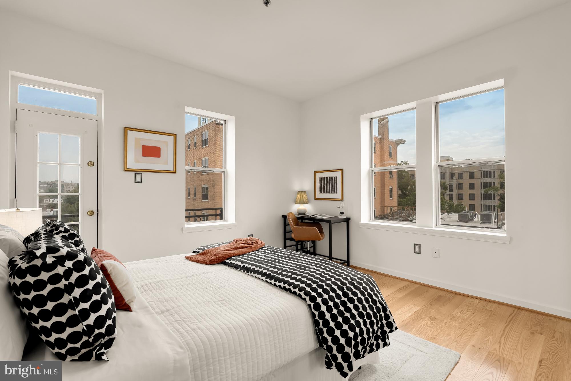1619 R Street Northwest, Unit 606 Washington, DC 20009 - Photo 13 of 25 a bedroom with a bed and a window