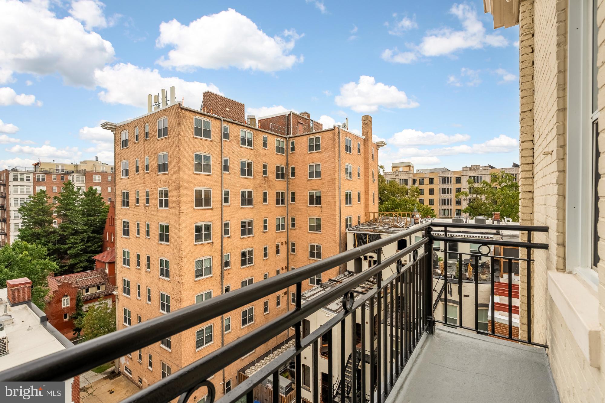 1619 R Street Northwest, Unit 606 Washington, DC 20009 - Photo 19 of 25 a view of a building from a balcony