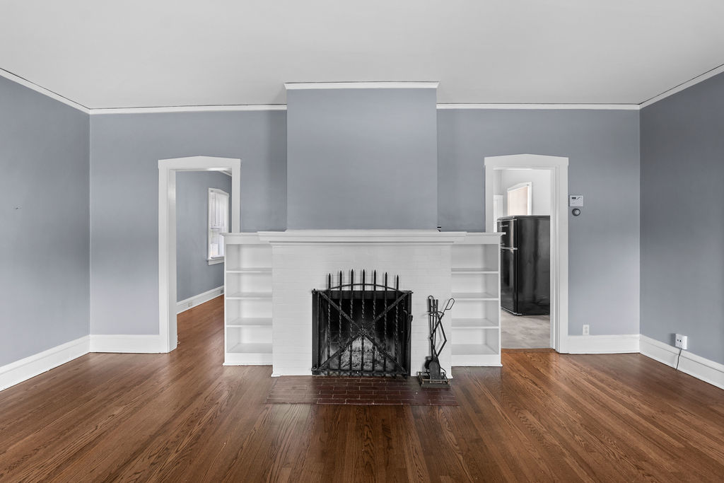 1201 North McKinley Road Lake Forest, IL 60045 - Photo 4 of 17 a living room with furniture and a fireplace