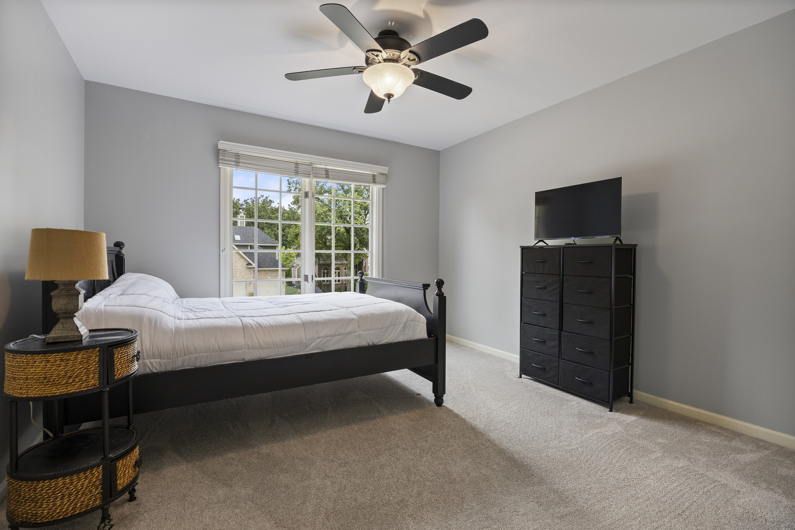 2177 Red Maple Lane Aurora, IL 60502 - Photo 23 of 40 a bedroom with a bed and a television