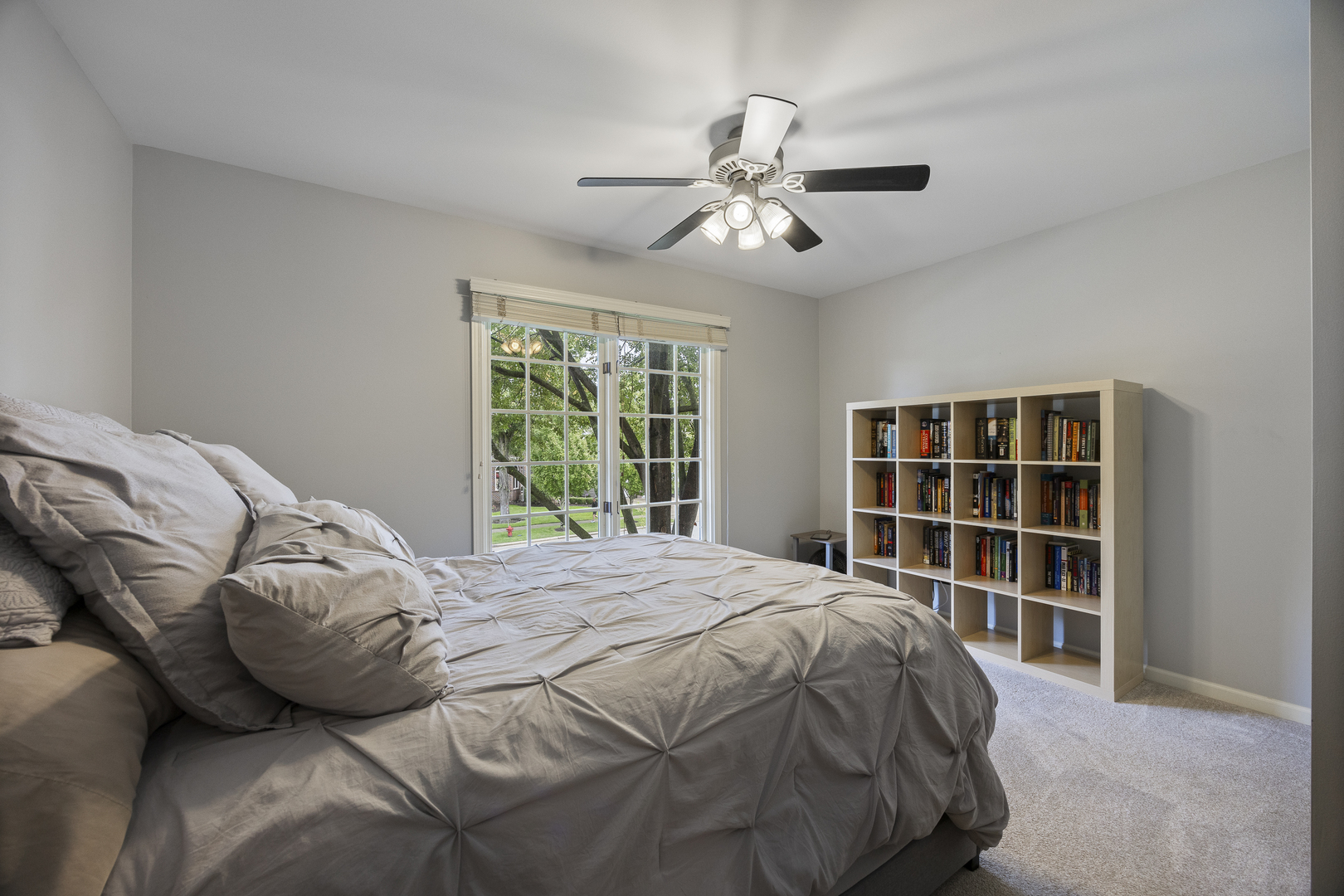 2177 Red Maple Lane Aurora, IL 60502 - Photo 24 of 40 a bed sitting in a bedroom next to a window