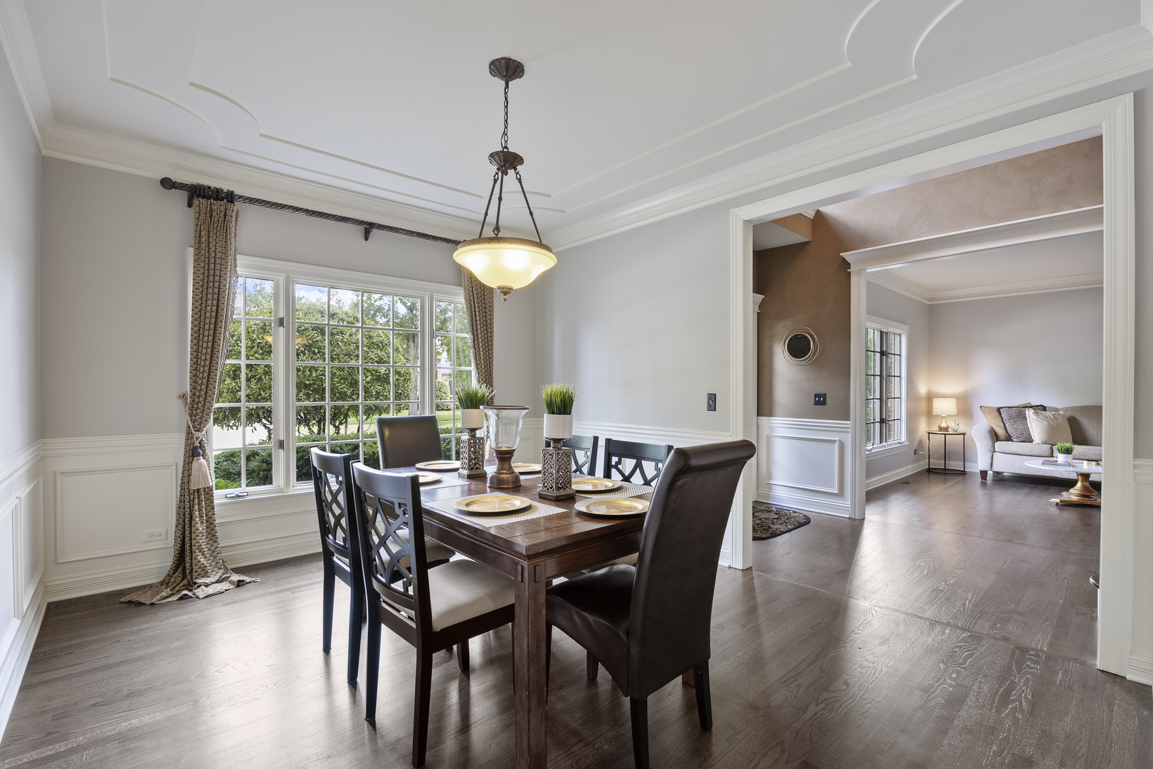 2177 Red Maple Lane Aurora, IL 60502 - Photo 3 of 40 a view of a dining room with furniture window and wooden floor