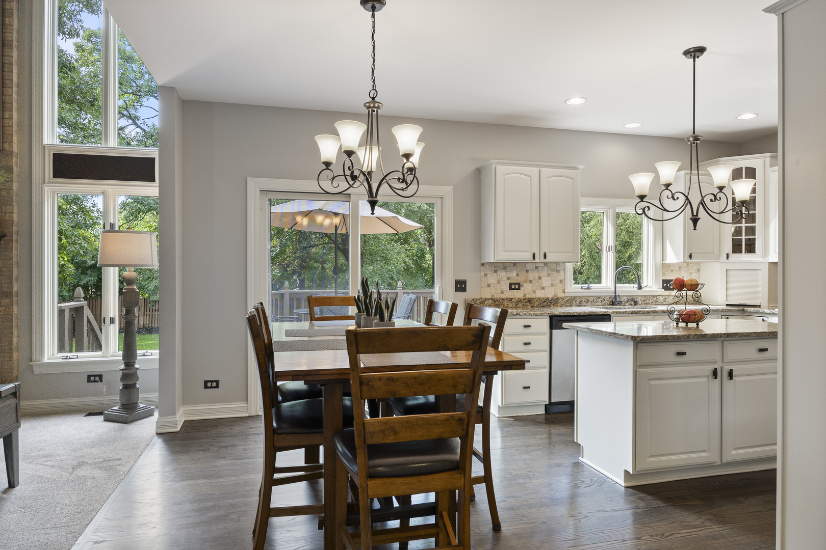 2177 Red Maple Lane Aurora, IL 60502 - Photo 10 of 40 a view of a dining room with furniture window and wooden floor