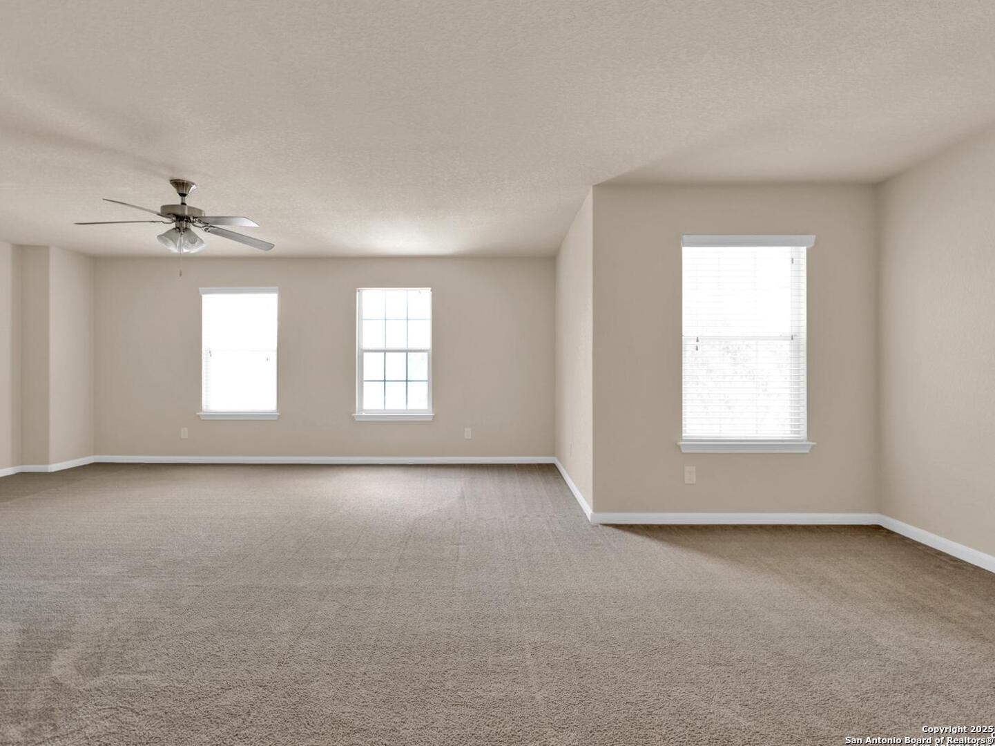 1008 Magellan Windcrest, TX 78239 - Photo 22 of 31 a view of an empty room with a window