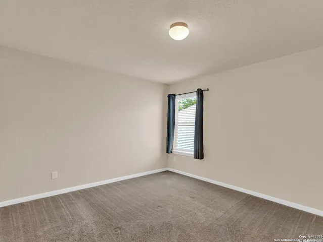 an empty room with a window