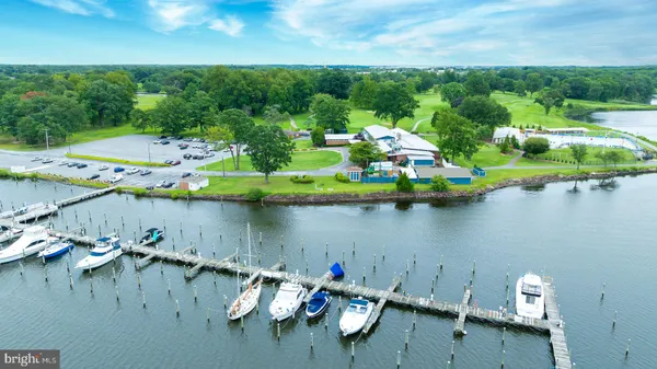 an aerial view of a house with a lake view
