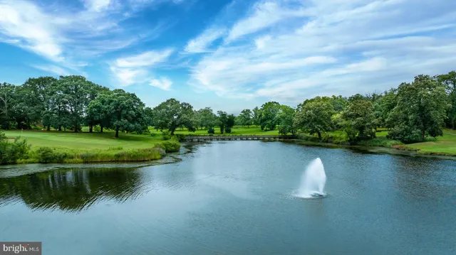 a view of a lake with a big yard
