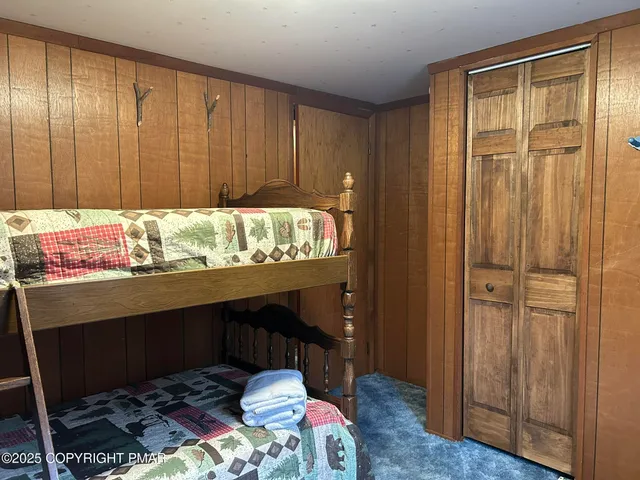 a room with storage and utility room view