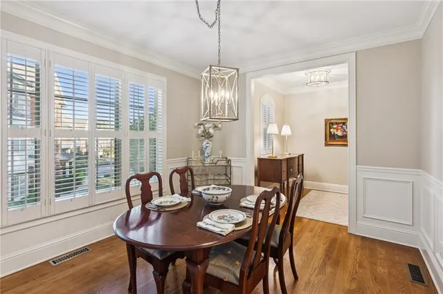 a kitchen with granite countertop stainless steel appliances and wooden cabinets
