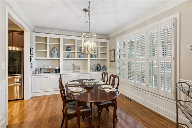 a work room with furniture and a window
