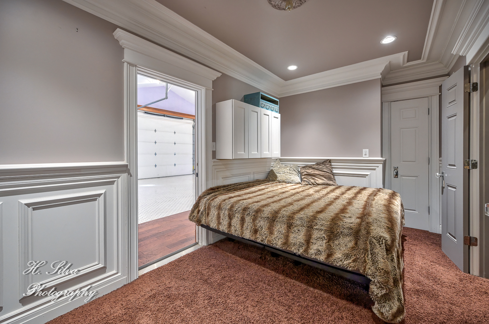 8106 Maple Street Marengo, IL 60152 - Photo 18 of 48 a bed sitting in a spacious bedroom next to a window