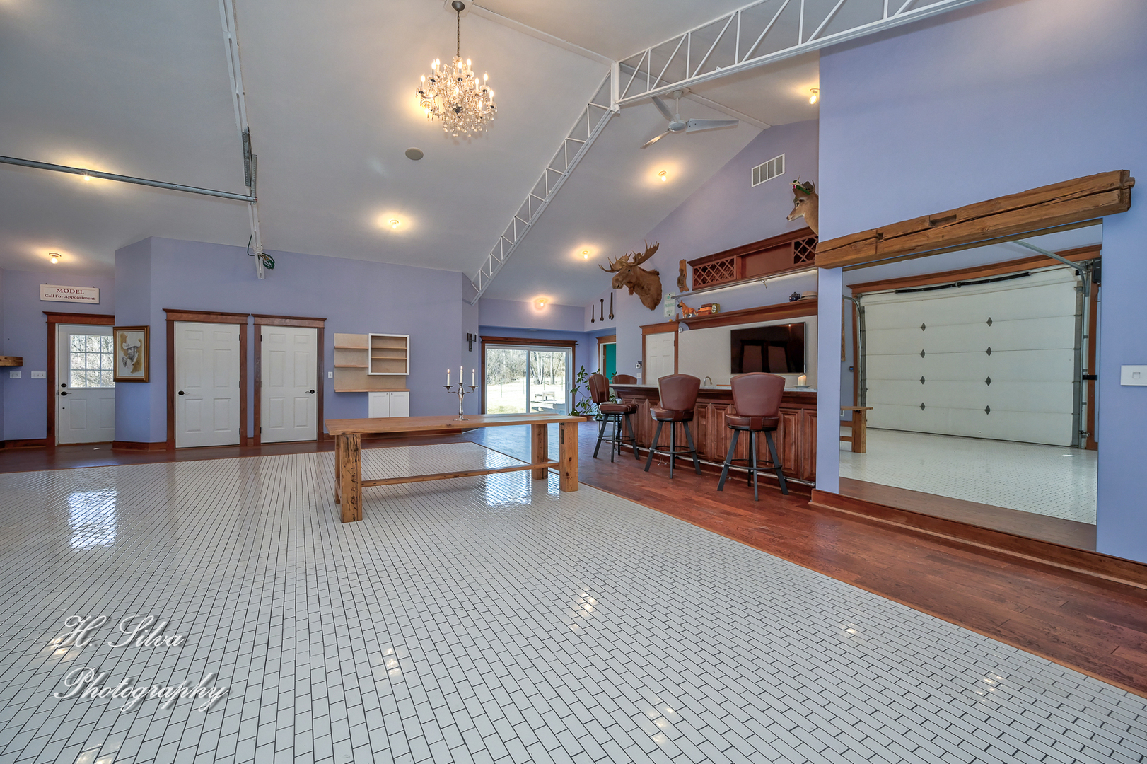 8106 Maple Street Marengo, IL 60152 - Photo 26 of 48 a view of a livingroom with furniture and a ceiling fan