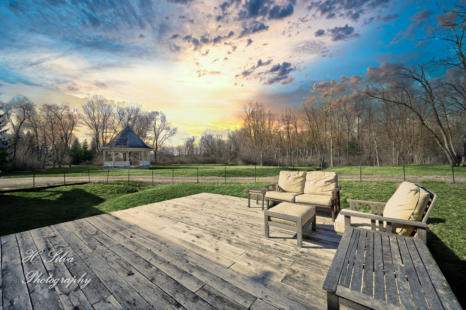 8106 Maple Street Marengo, IL 60152 - Photo 29 of 48 a view of a lake with couches and wooden floor