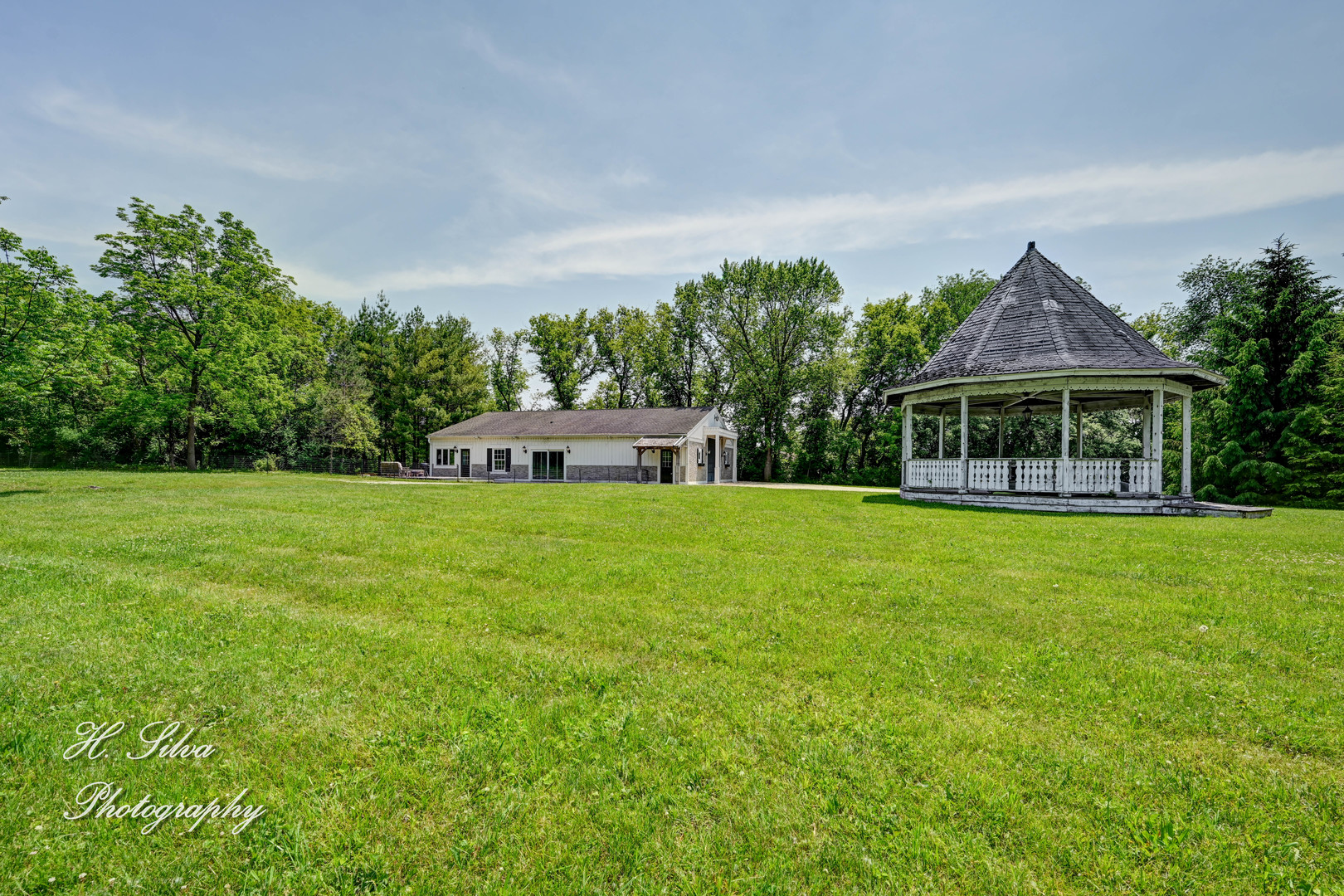 8106 Maple Street Marengo, IL 60152 - Photo 3 of 48 a front view of house with yard and green space