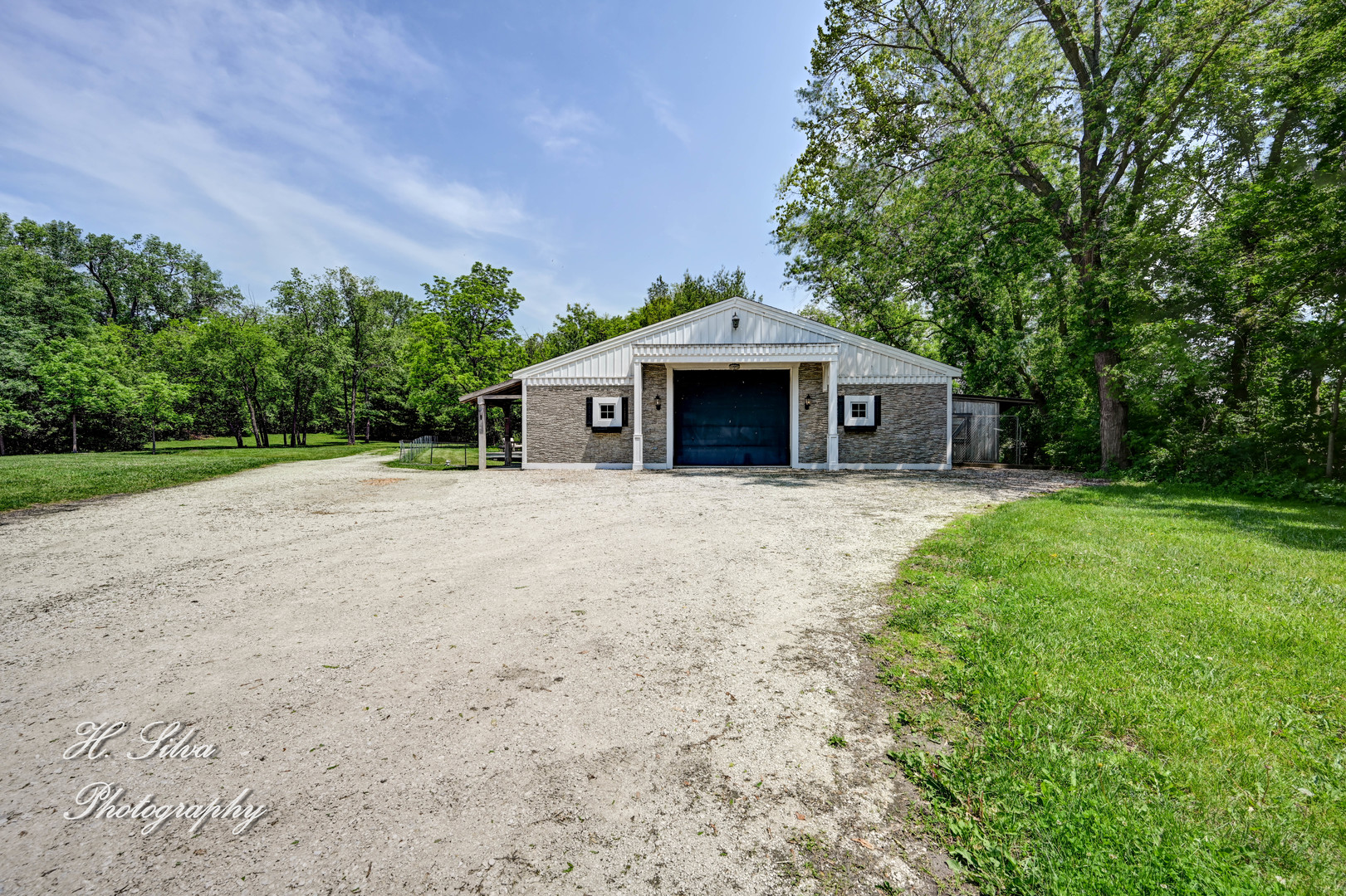 8106 Maple Street Marengo, IL 60152 - Photo 36 of 48 a front view of a house with garden