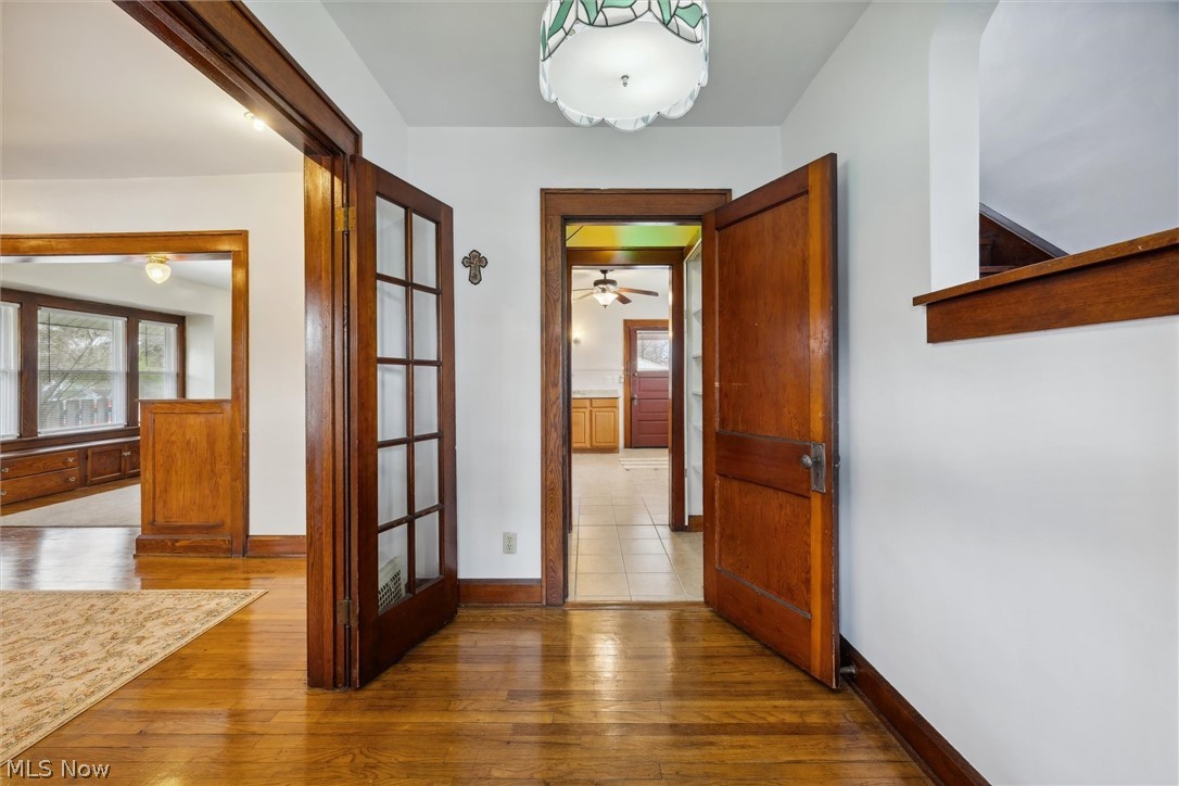 64 West Bagley Road Berea, OH 44017 - Photo 14 of 48 Hall featuring light hardwood / wood-style floors and french doors