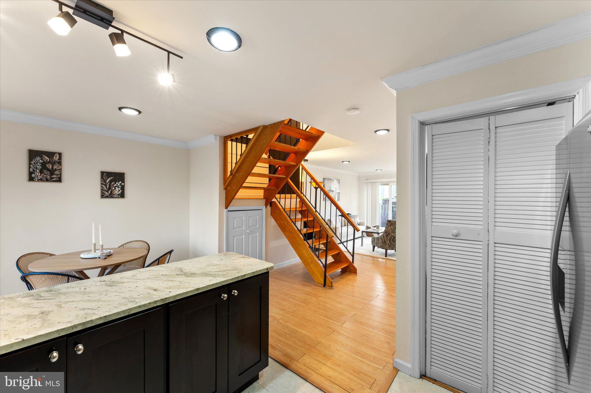 2231 Southgate Square Reston, VA 20191 - Photo 17 of 36 a kitchen with sink and mirror