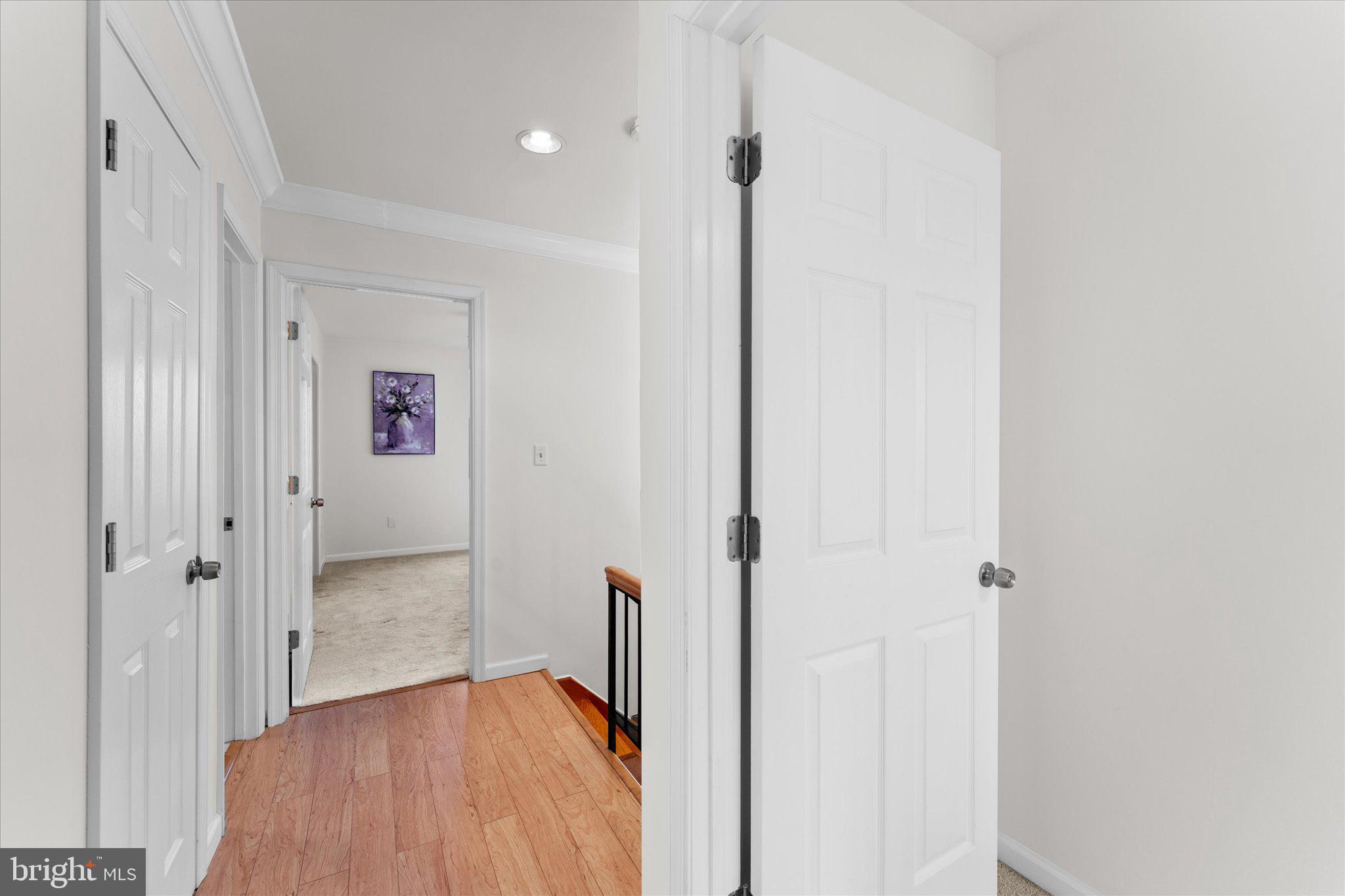 2231 Southgate Square Reston, VA 20191 - Photo 20 of 36 a view of a hallway with wooden floor