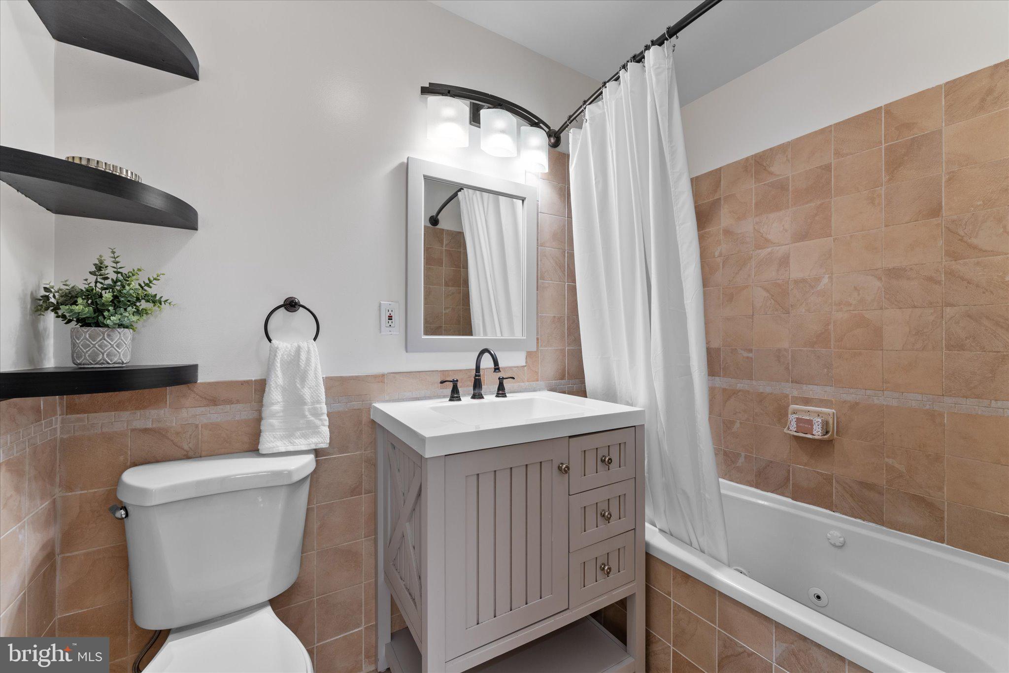 2231 Southgate Square Reston, VA 20191 - Photo 24 of 36 a bathroom with a sink toilet and shower