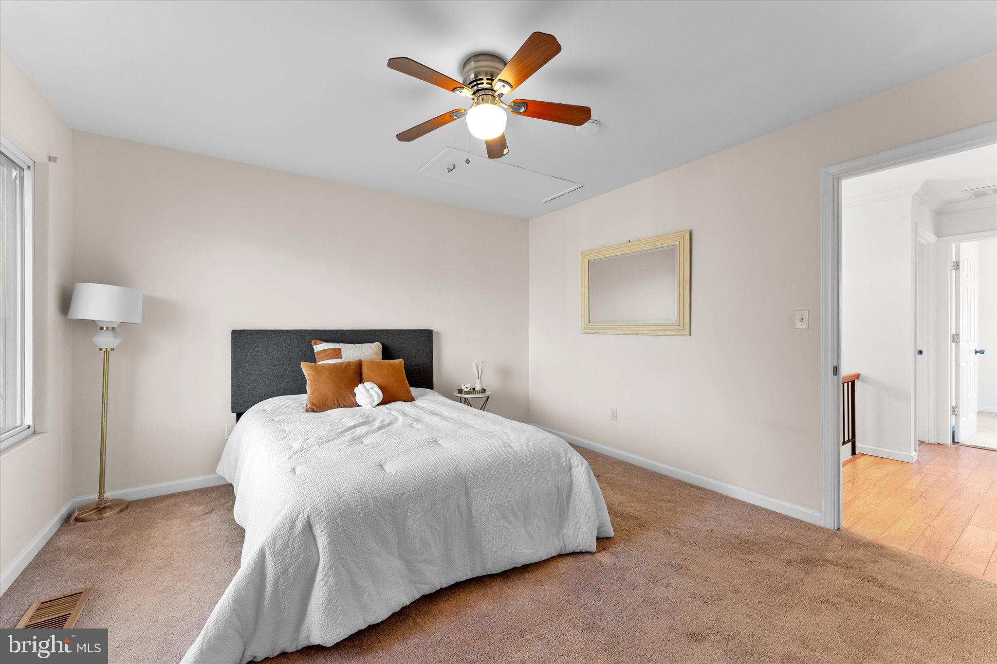 2231 Southgate Square Reston, VA 20191 - Photo 31 of 36 a bedroom with a bed and a chandelier