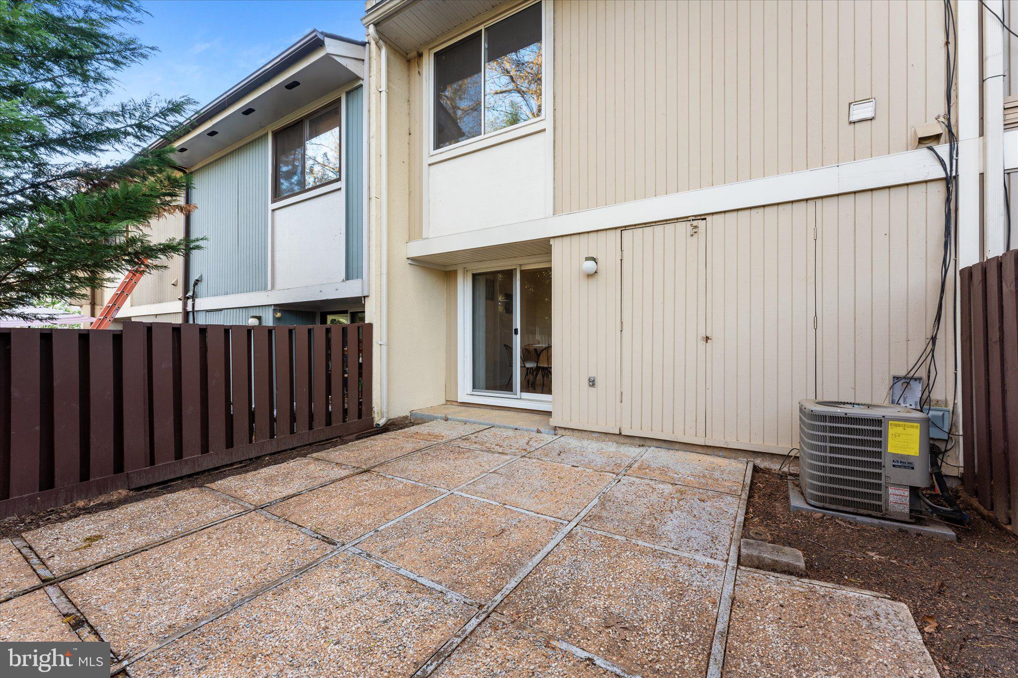 2231 Southgate Square Reston, VA 20191 - Photo 34 of 36 a view of a house with backyard and wooden fence