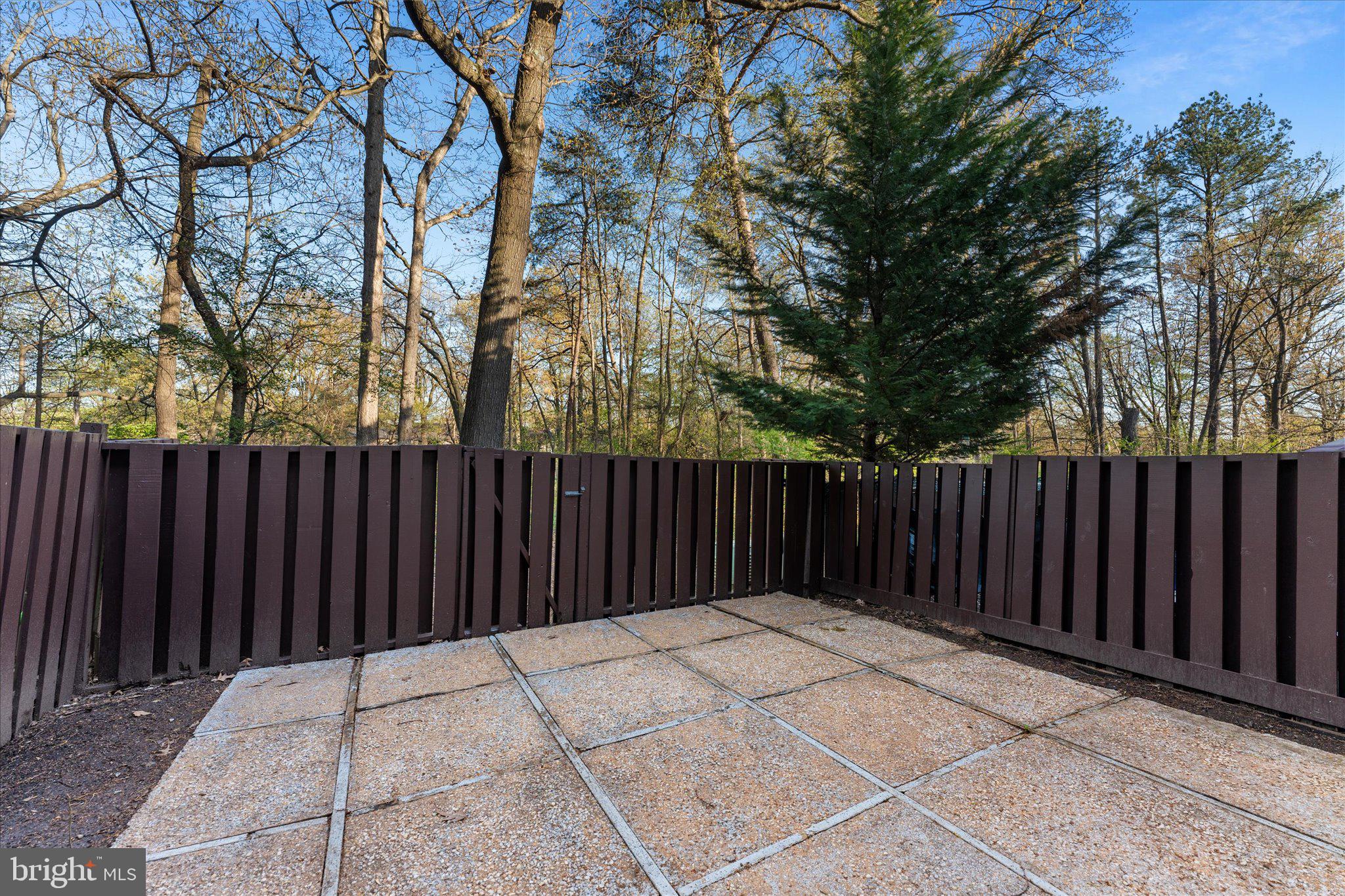 2231 Southgate Square Reston, VA 20191 - Photo 35 of 36 a view of backyard with wooden fence